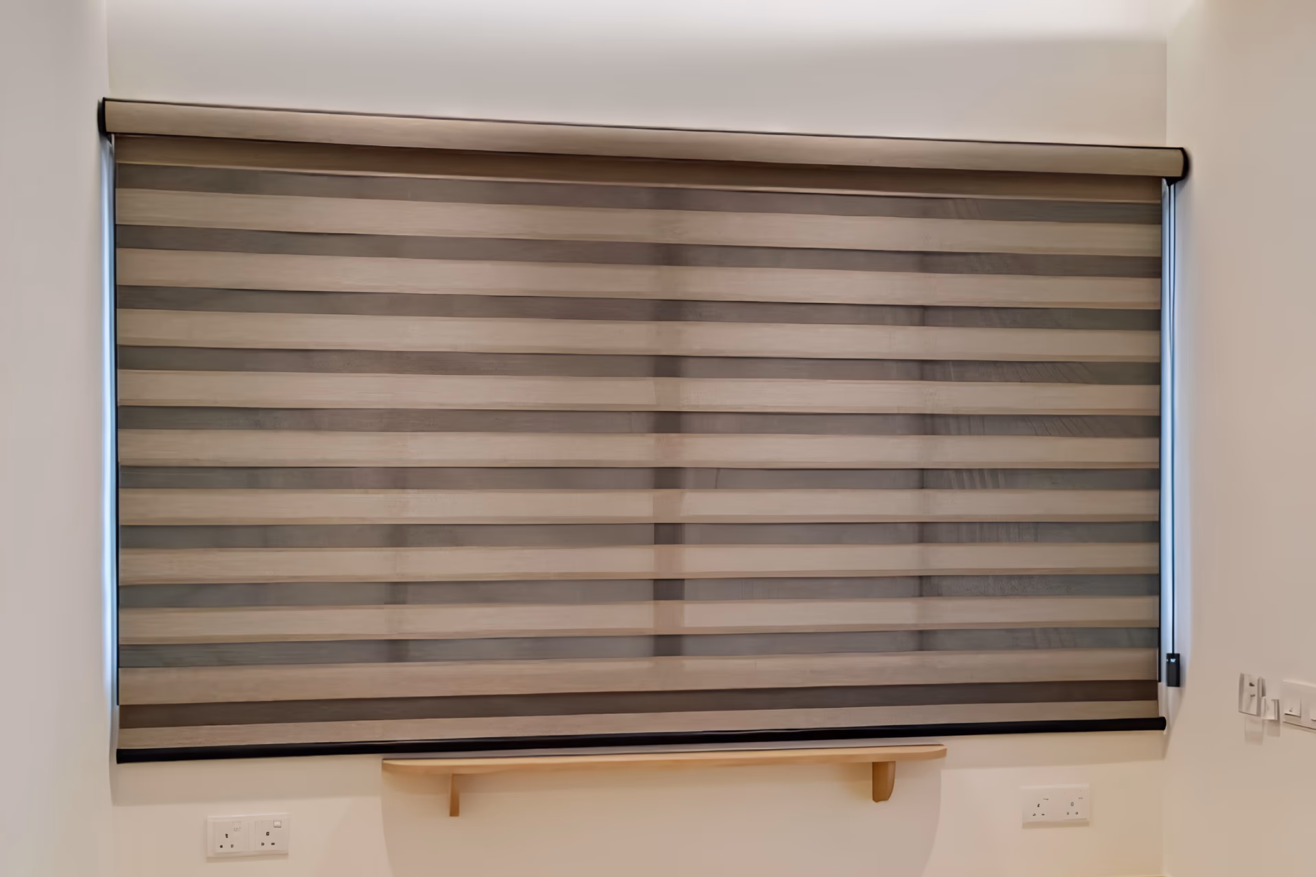 Korean combi blind with alternating sheer and solid bands covering a wide Singapore window