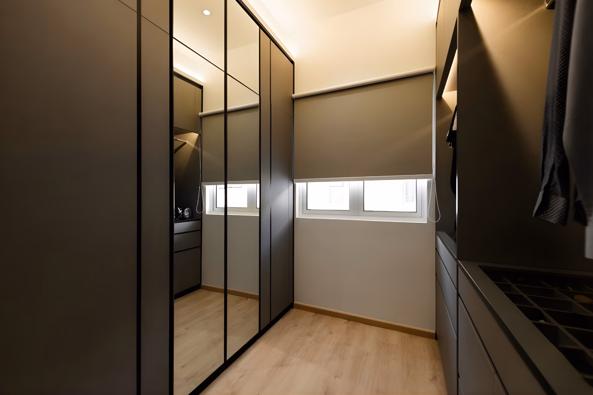 Roller blinds fitted above a built-in study desk in a Singapore HDB flat